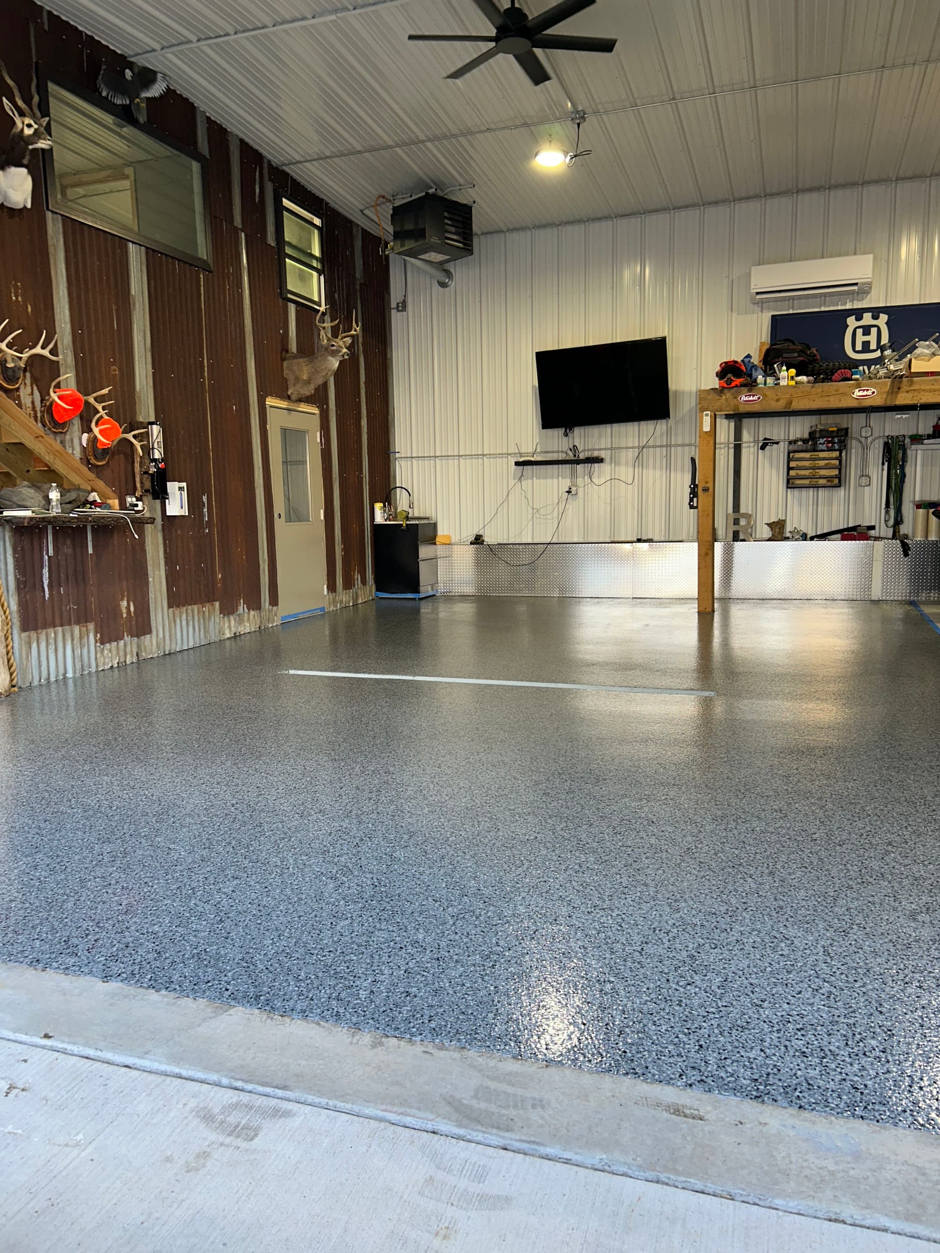 Full flake polyaspartic garage floor in the "nightfall" colorway